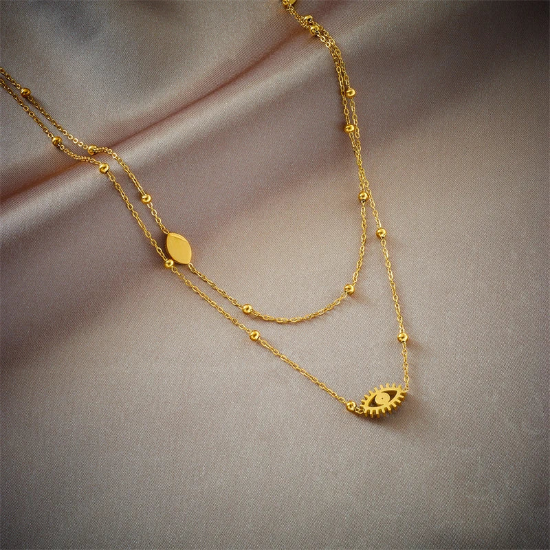 Livia – Collier Double Couche Œil de Protection