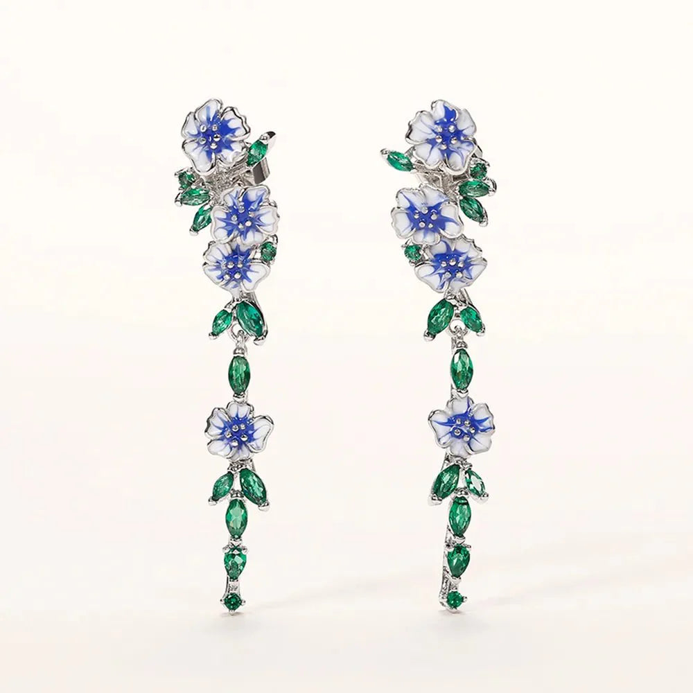 Yara – Boucles d’Oreilles Pendantes Fleuries Bleues