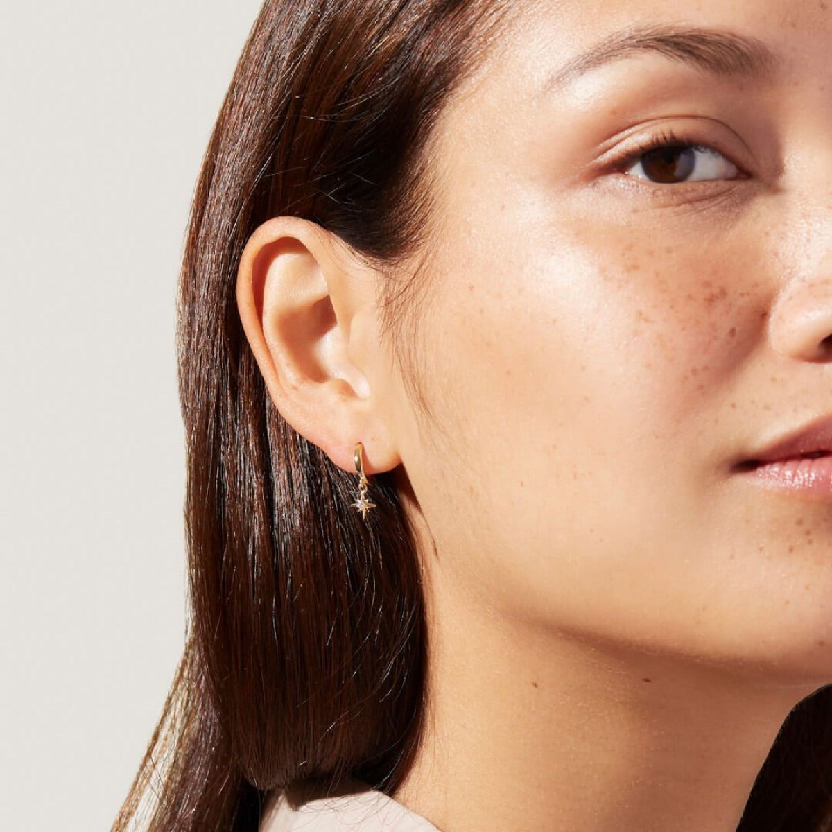 Stellia – Boucles d’Oreilles Étoile à Huit Branches en Zircon