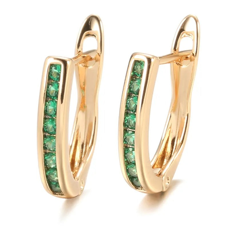 Christine – Boucles Dorées Émeraude & Diamant