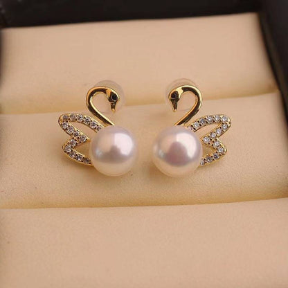Boucles d'oreilles en or cygne et diamant