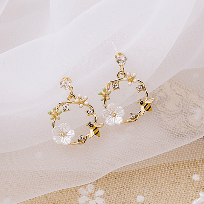 Boucles d'oreilles femmes avec design de fleur (paire)