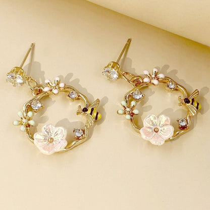 Boucles d'oreilles femmes avec design de fleur (paire)