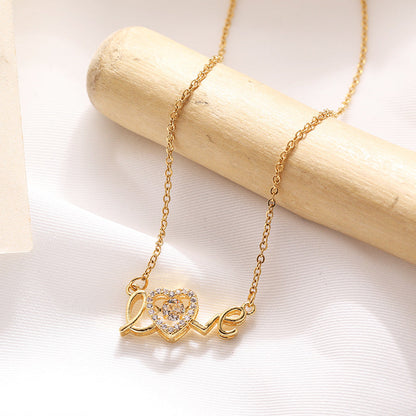 Love Spelled - Collier avec pendentif en forme de cœur