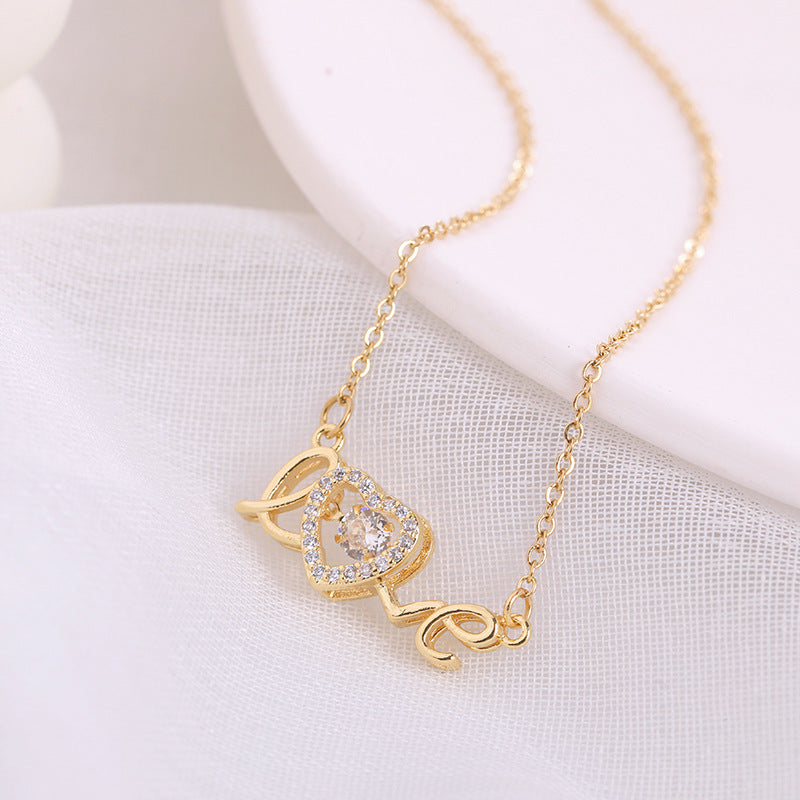 Love Spelled - Collier avec pendentif en forme de cœur