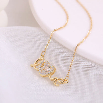 Love Spelled - Collier avec pendentif en forme de cœur