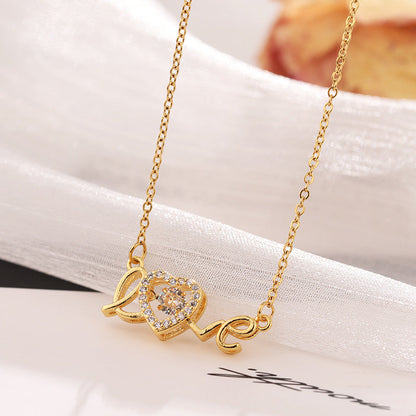 Love Spelled - Collier avec pendentif en forme de cœur