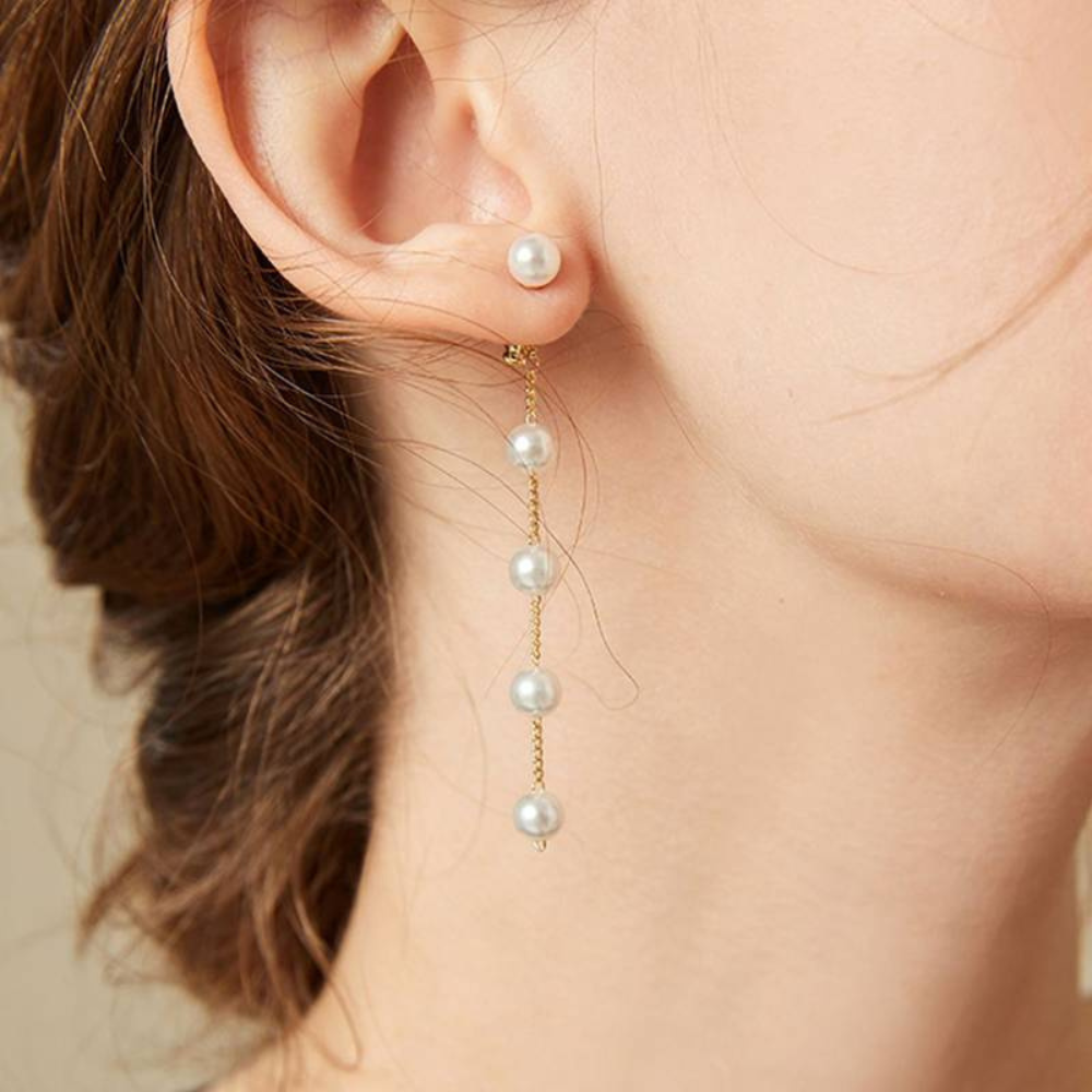 Boucles d'oreilles longues avec gouttes de perles