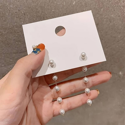 Boucles d'oreilles longues avec gouttes de perles