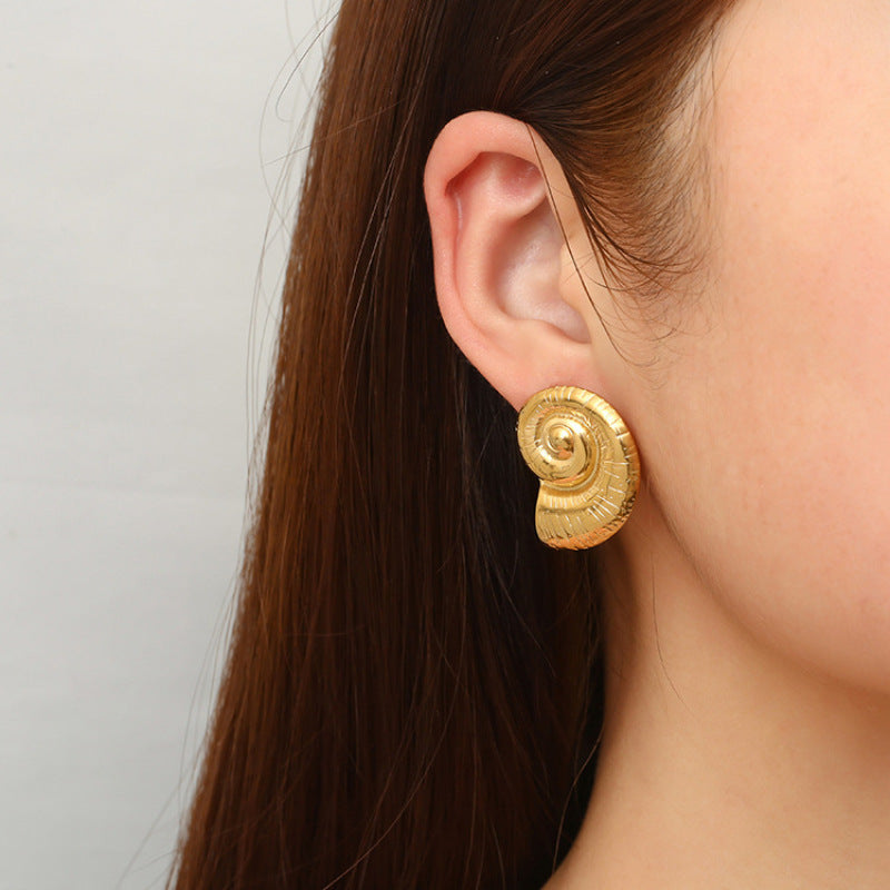 Pia – Boucles d’Oreilles Coquillage Élégantes
