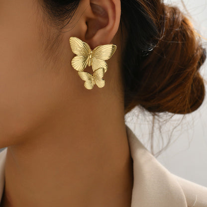 Aurelia – Boucles d’Oreilles Papillon Élégantes