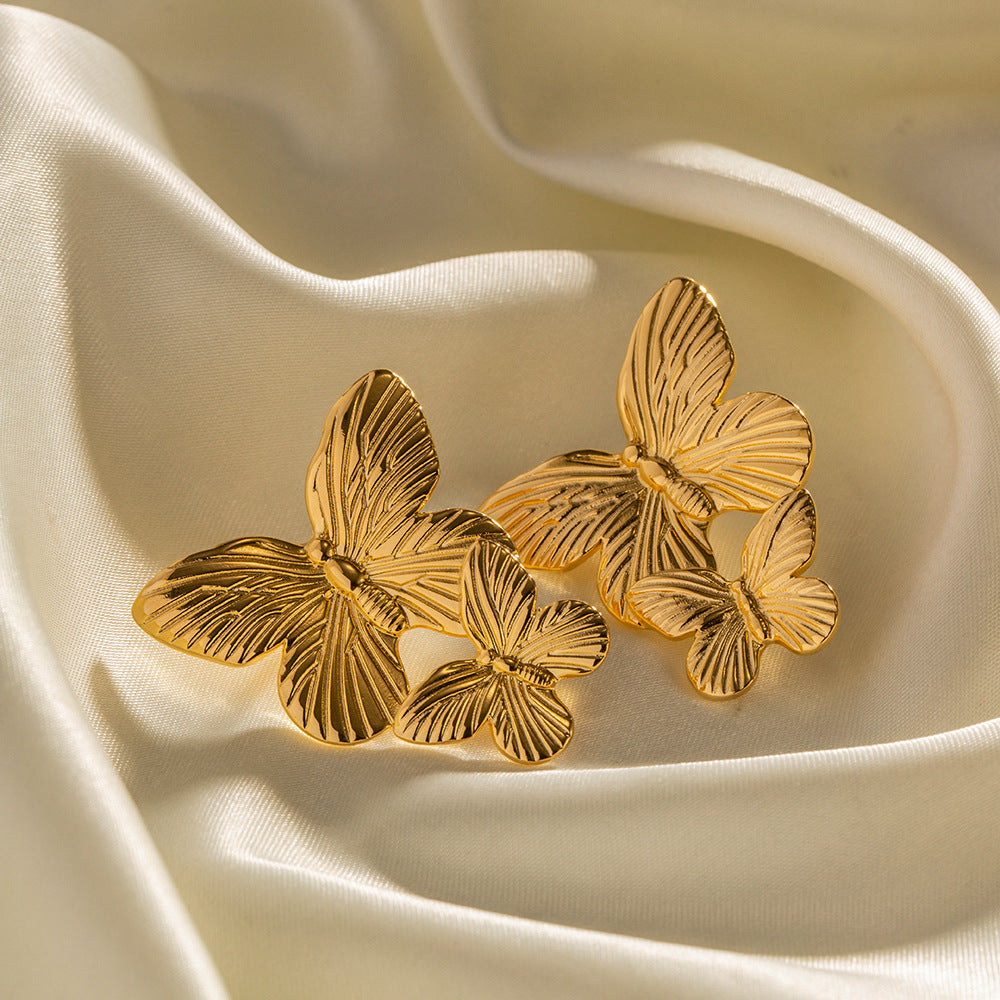 Aurelia – Boucles d’Oreilles Papillon Élégantes