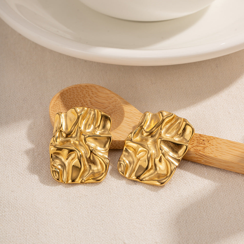 Aurora – Boucles d’Oreilles Sculptées Élégantes