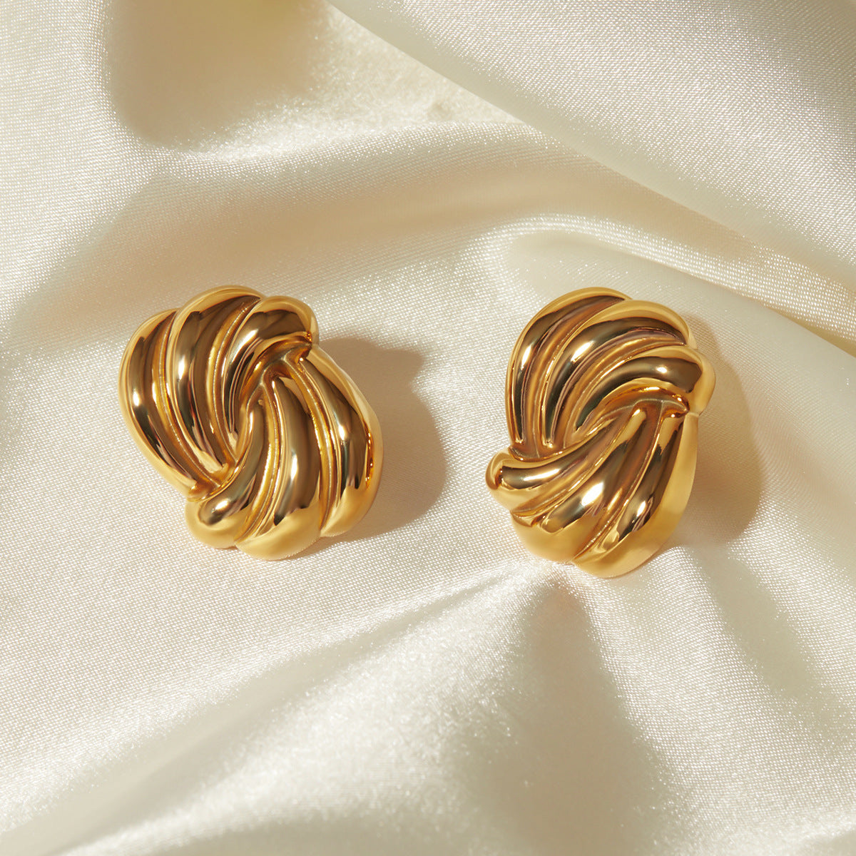 Ara – Boucles d’Oreilles Spirales Dorées