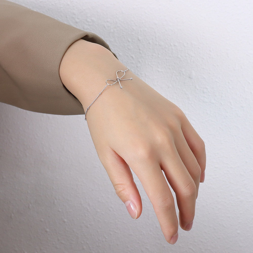Faye – Bracelet Nœud Fin et Élégant