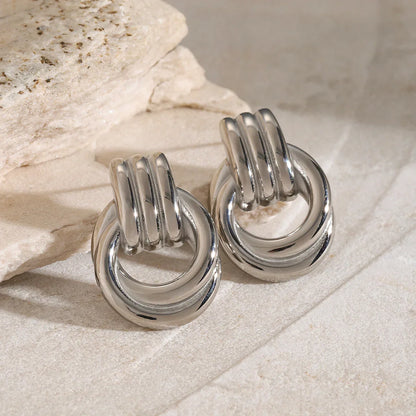 Nyra – Boucles d’Oreilles Géométriques Torsadées