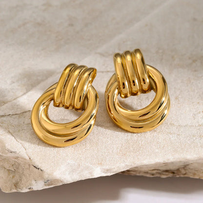 Nyra – Boucles d’Oreilles Géométriques Torsadées