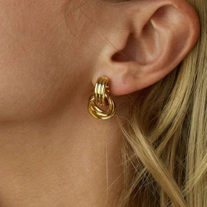 Nyra – Boucles d’Oreilles Géométriques Torsadées