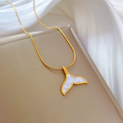 Naia – Collier Pendentif Coquillage Queue de Poisson Doré