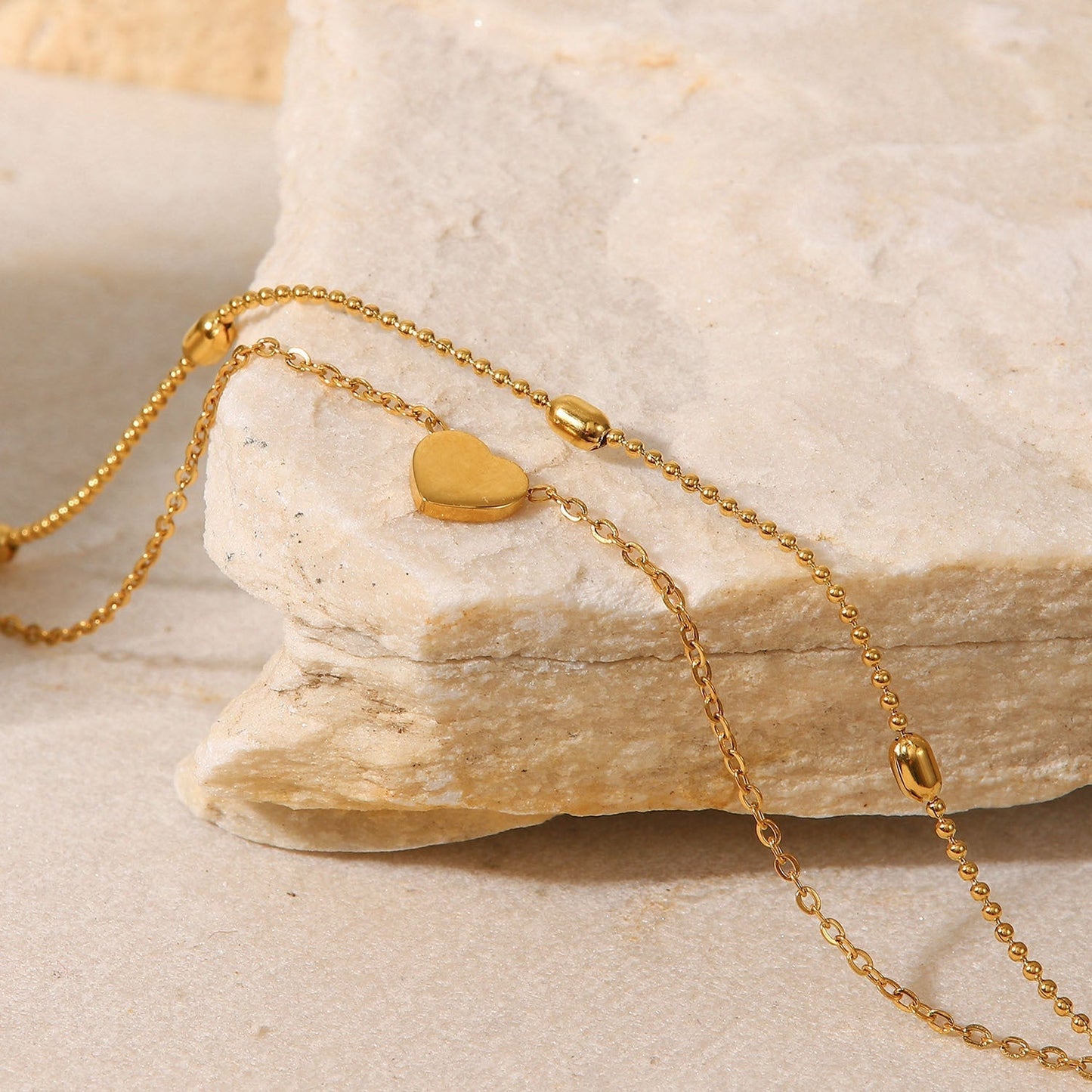 Rami – Bracelet de Cheville Cœur Doré Double Couches
