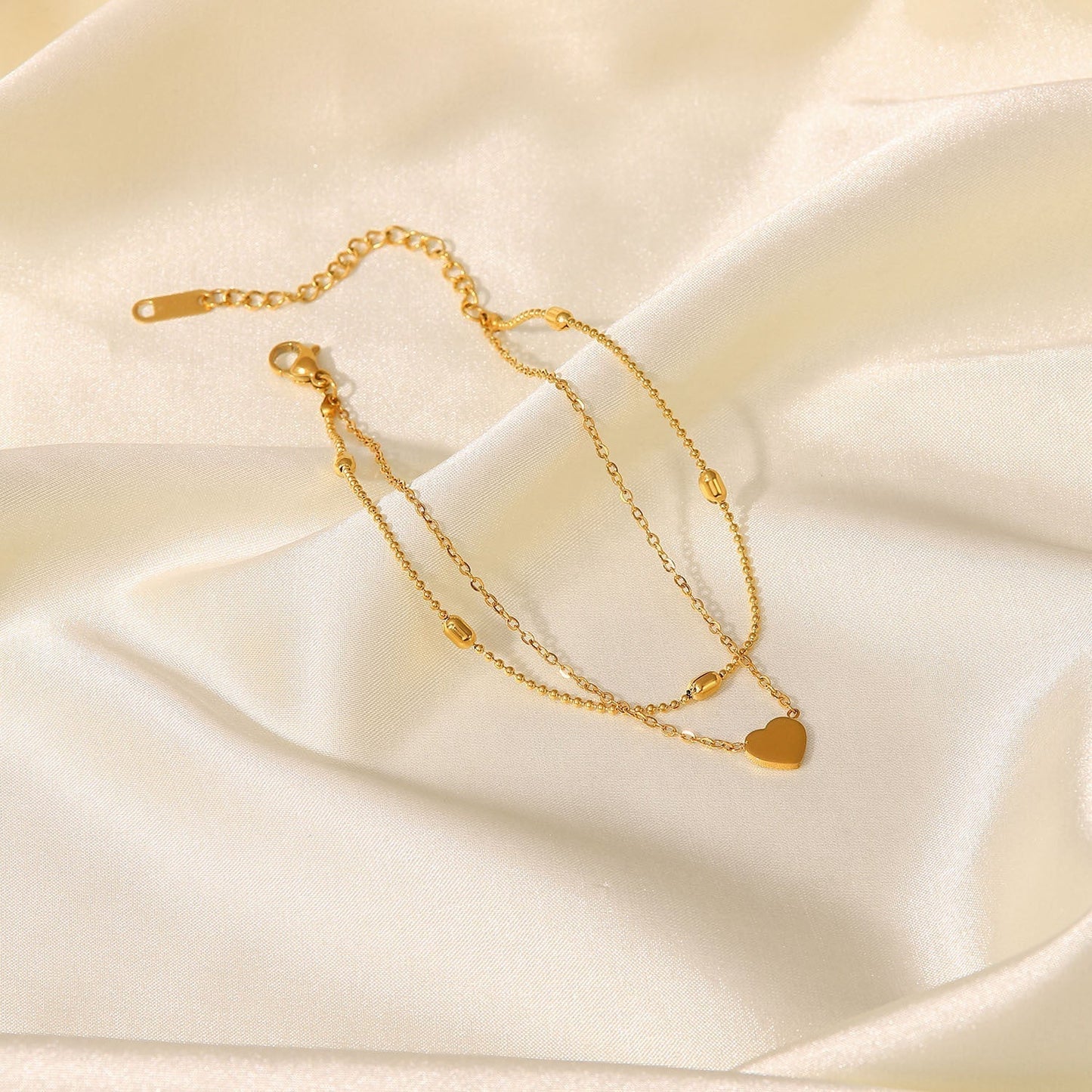Rami – Bracelet de Cheville Cœur Doré Double Couches