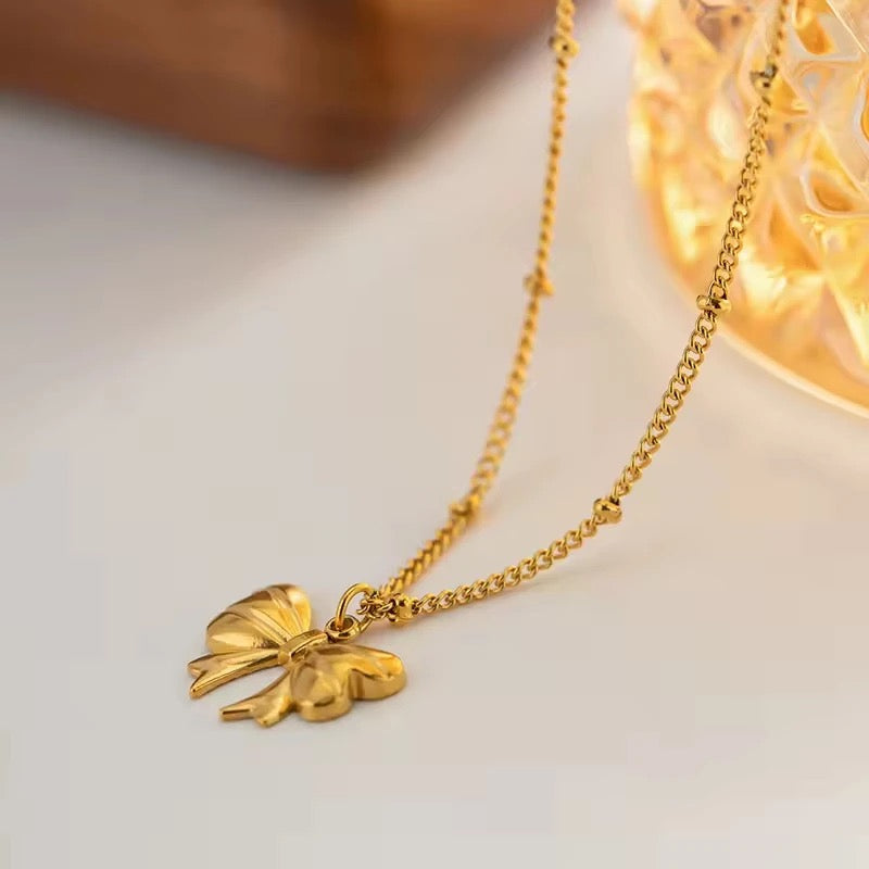 Rhia – Collier Pendentif Papillon