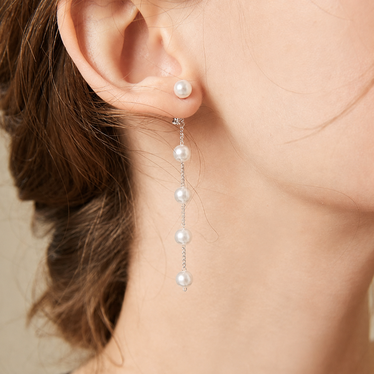 Boucles d'oreilles longues avec gouttes de perles