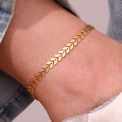 Sisi – Bracelet de Cheville Feuilles Dorées