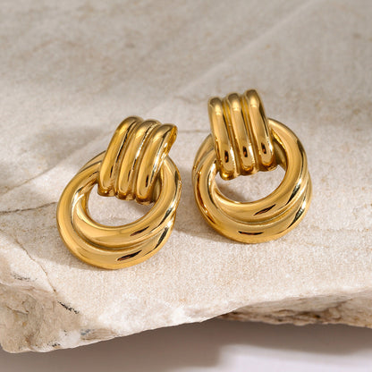 Anna – Boucles d'Oreilles Créoles Entrelacées Élégantes