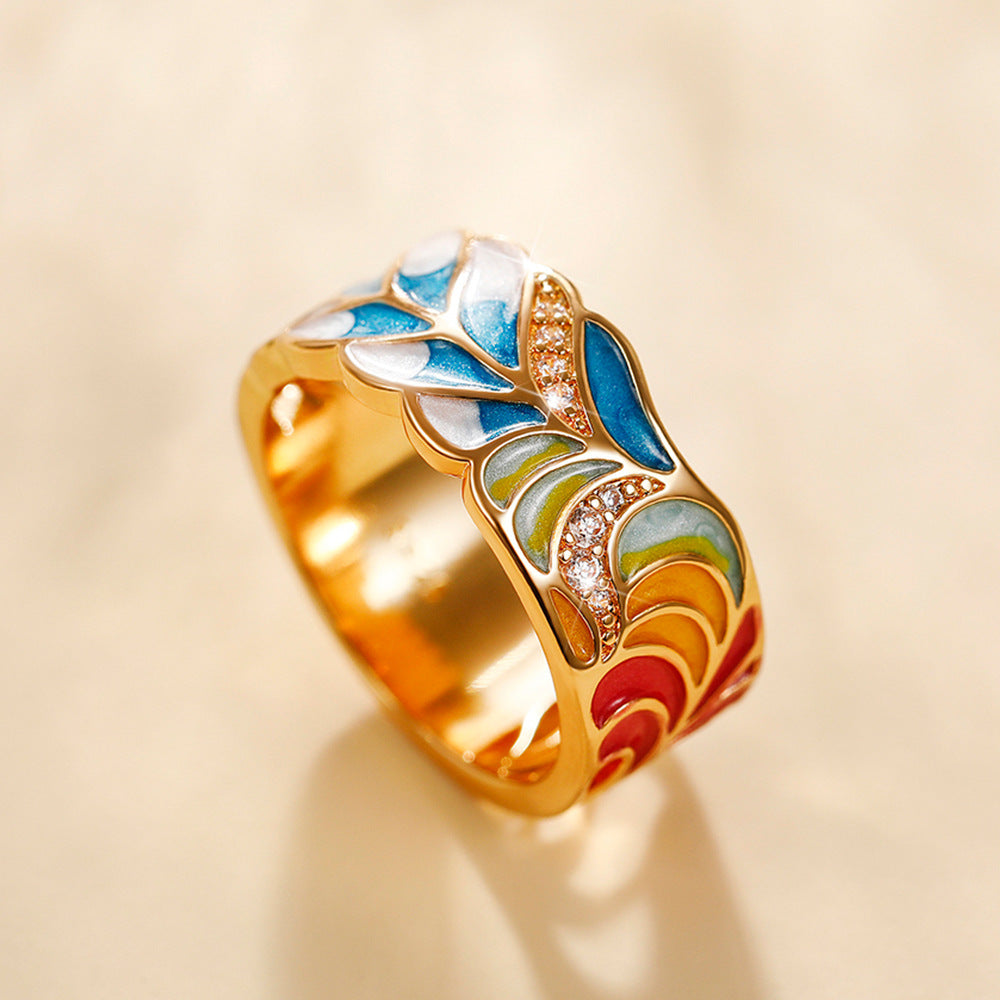 Margaux – Bague Dorée Motif Céramique Bleu et Blanc