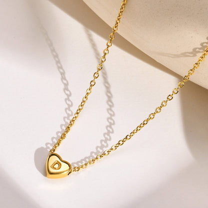 Arielle – Collier Cœur Initiale Doré