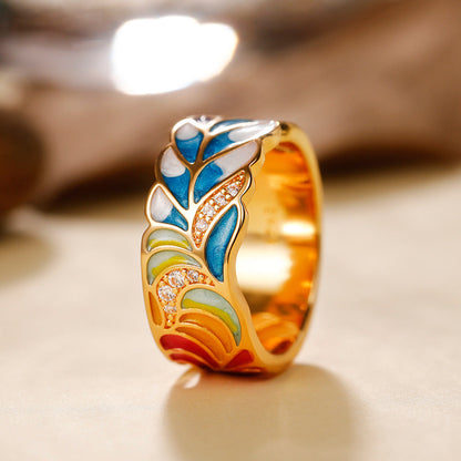 Margaux – Bague Dorée Motif Céramique Bleu et Blanc