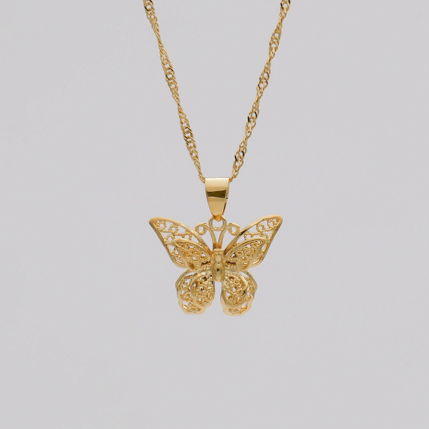 Amy – Collier Papillon Découpé Doré