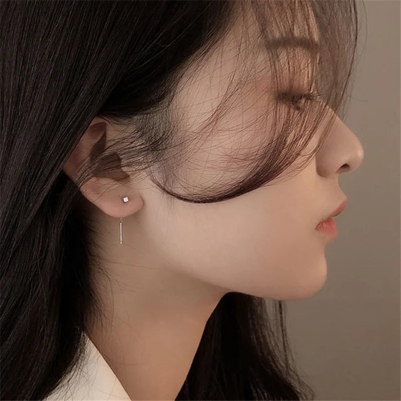 Kaelen – Boucles d'Oreilles Cube et Glands Élégants