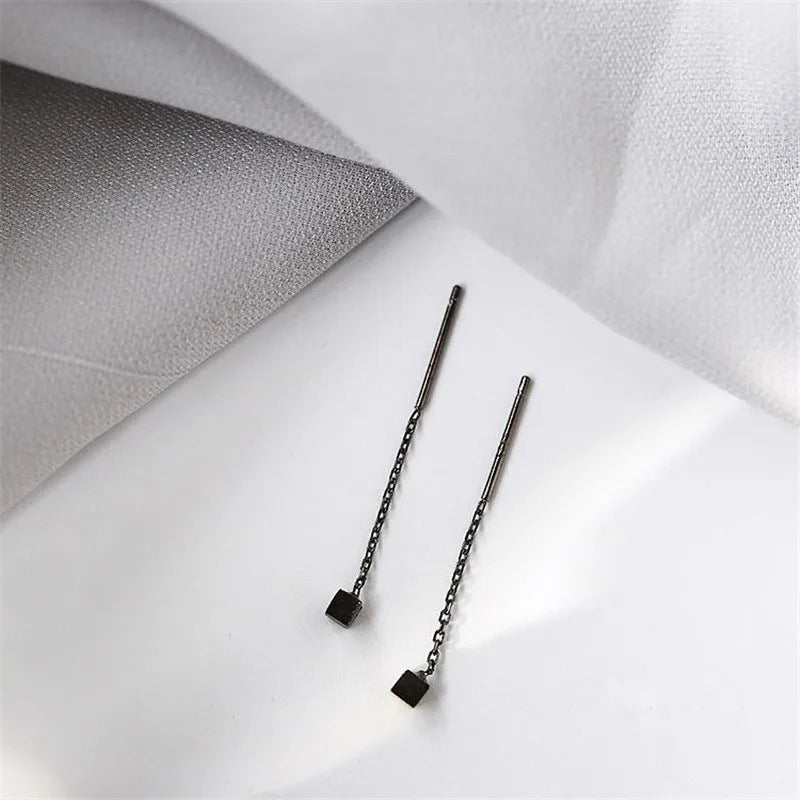 Kaelen – Boucles d'Oreilles Cube et Glands Élégants