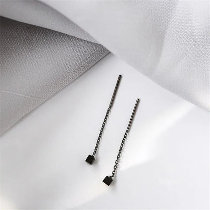 Kaelen – Boucles d'Oreilles Cube et Glands Élégants