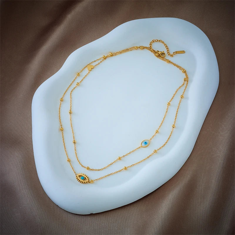 Livia – Collier Double Couche Œil de Protection