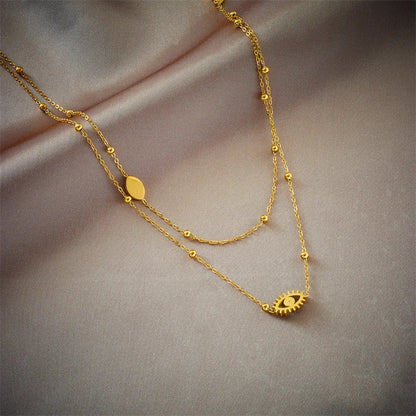 Livia – Collier Double Couche Œil de Protection