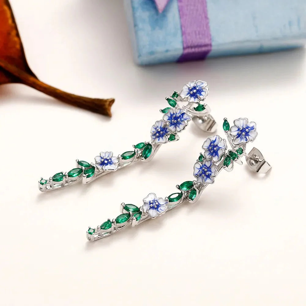 Yara – Boucles d’Oreilles Pendantes Fleuries Bleues