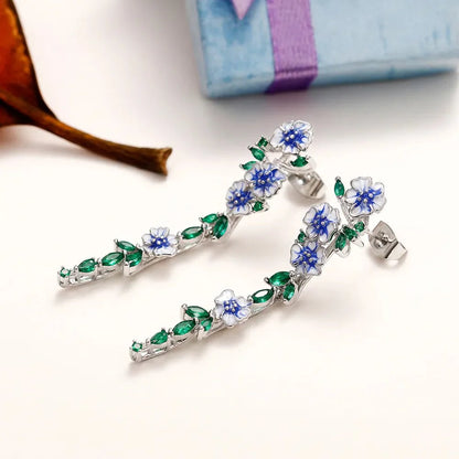 Yara – Boucles d’Oreilles Pendantes Fleuries Bleues