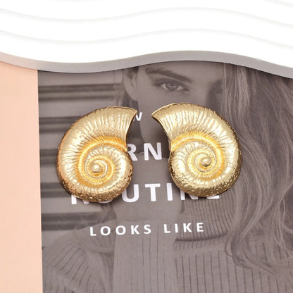 Pia – Boucles d’Oreilles Coquillage Élégantes