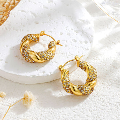 Alix – Boucles d’Oreilles Dorées U Twist