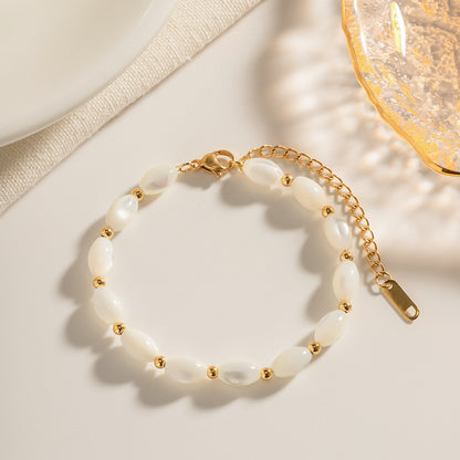 Clara – Bracelet ovale en acier inoxydable doré
