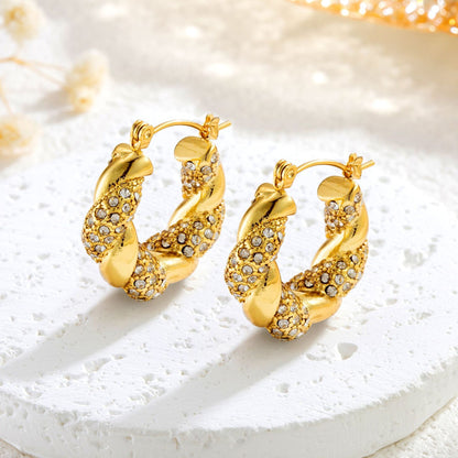 Alix – Boucles d’Oreilles Dorées U Twist