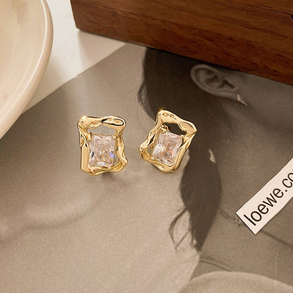 Hana – Boucles d’Oreilles Pierre Dorée Liquide