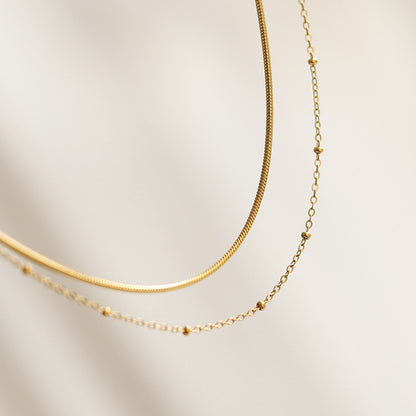 Selya – Collier Double Rang Chaîne Serpent et Perles en Or