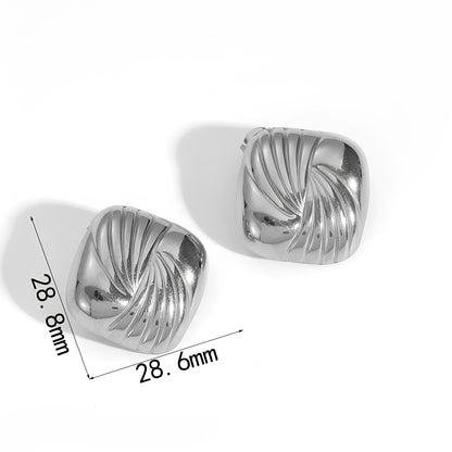 Kaia – Clous Géométriques Acier Titane