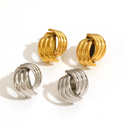 Selene – Clous d’Oreilles Croix en Acier Titane