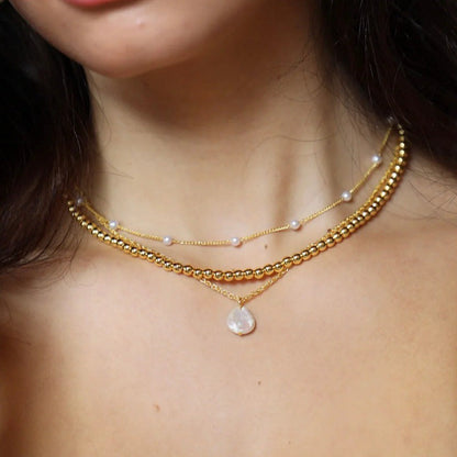 Ami – Collier Perles Élégant