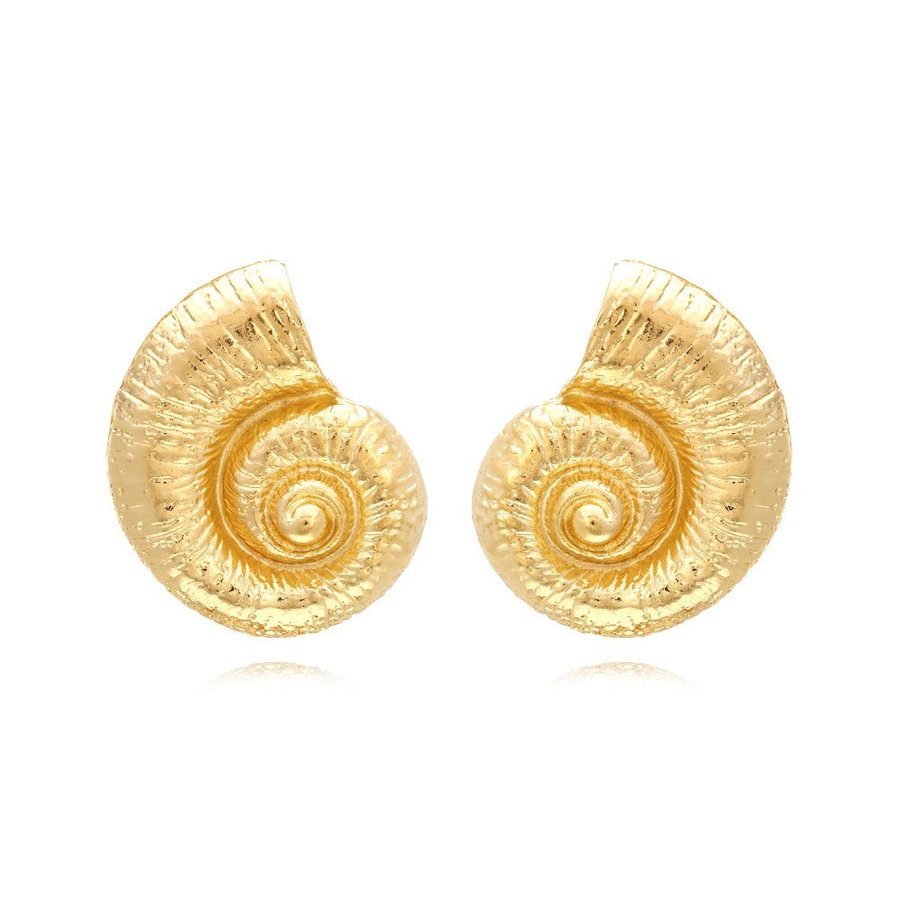 Pia – Boucles d’Oreilles Coquillage Élégantes